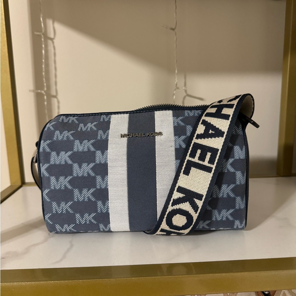 Blue Michael Kors barrel crossbody
